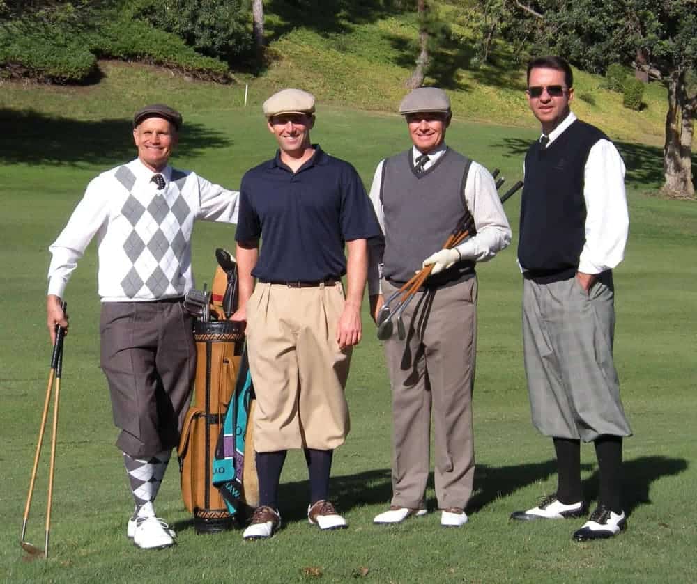 Golfers wearing golf clothes