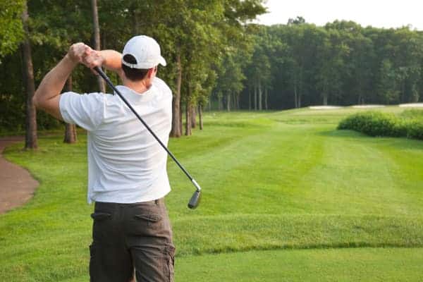 Golfer looking down the fairway