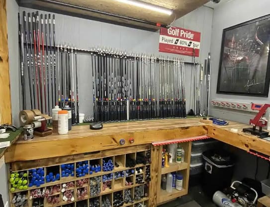 Golf club shafts and heads in the rack