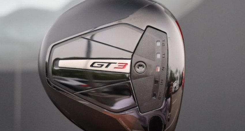 Close-up of a black Titleist GT3 Driver head with "GT3" lettering, detailing its adjustable settings and sleek design, ideal for golfers comparing drivers.