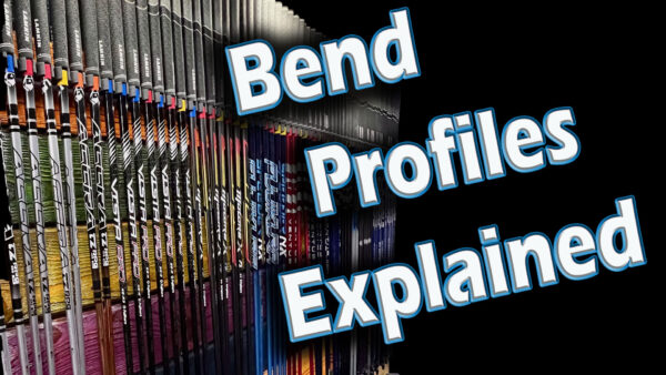 A display of various golf club shafts with the text "Bend Profiles Explained" in large white and blue letters over the image.