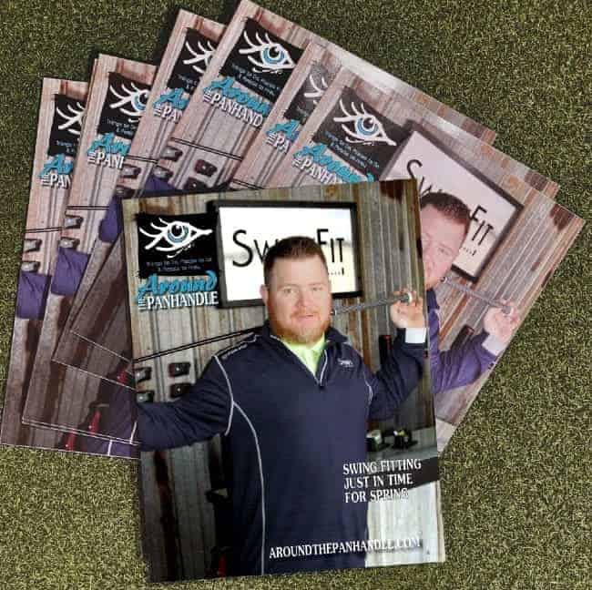 A stack of magazines featuring a man in a navy jacket holding weights on the cover, with the text “Swing Fit, Just in Time for Spring,” and “Around the Panhandle.”.